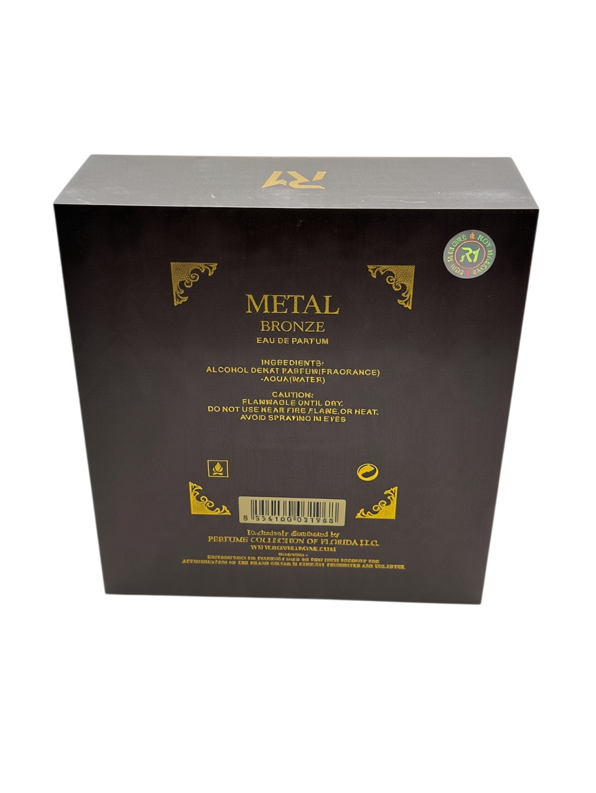 Aromisca Metal Bronze men's cologne perfume box back view with gold text and ingredients list on a dark brown surface.