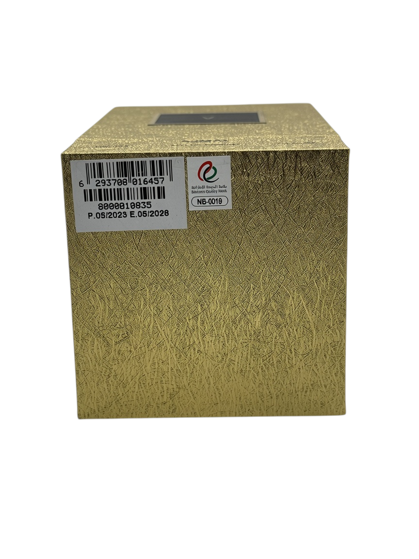 Paradime Enterprise LLC Ajmal Gold Collection V perfume box with textured gold finish and barcode label