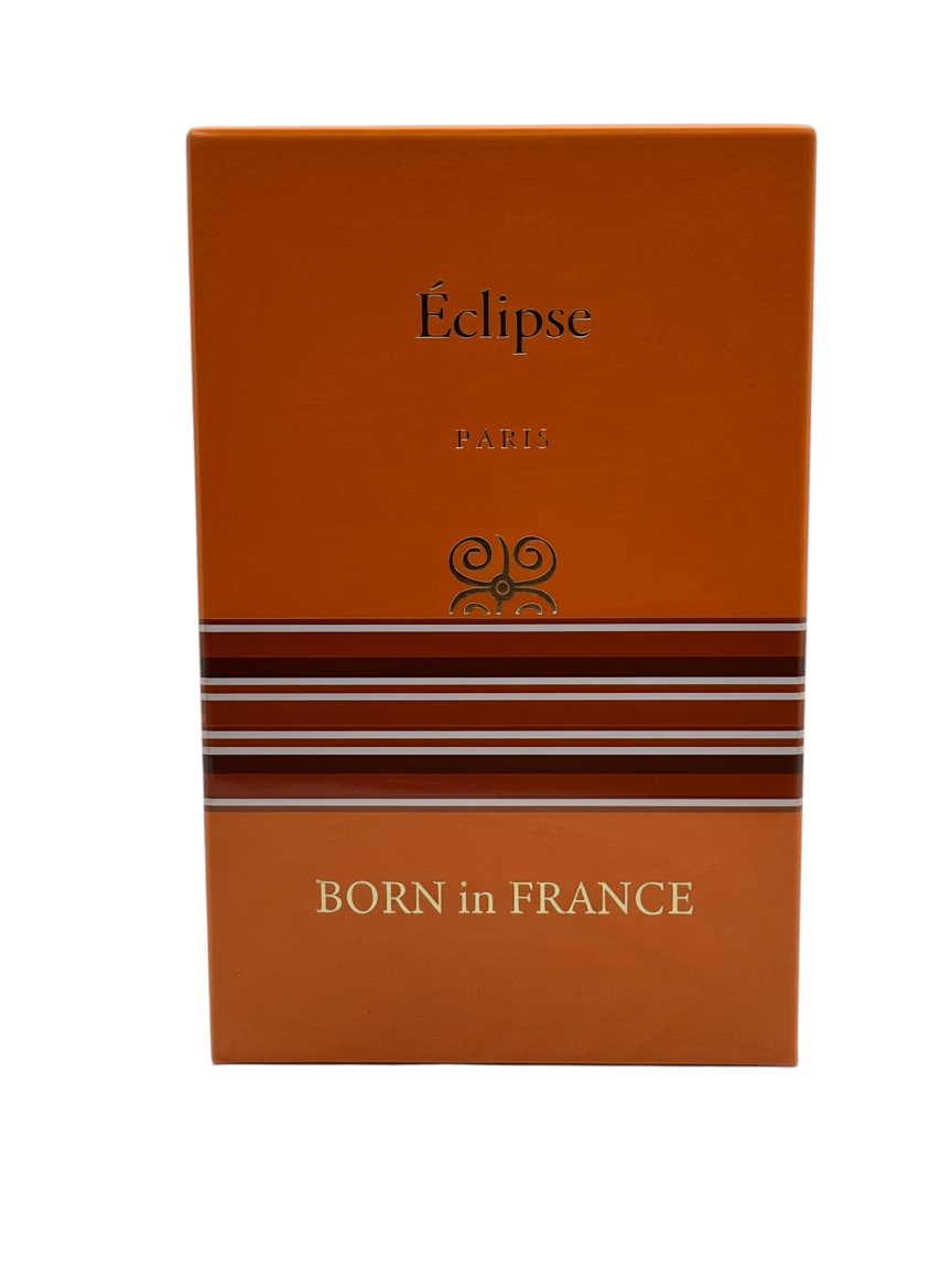 Paradime Enterprise LLC Eclipse by Born in France unisex perfume box in orange with brown and white striped accents.
