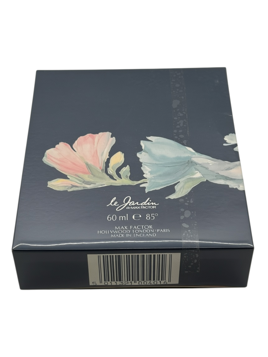Paradime Enterprise LLC vintage Le Jardin de Max Factor 60ml perfume box with floral illustration on dark blue background