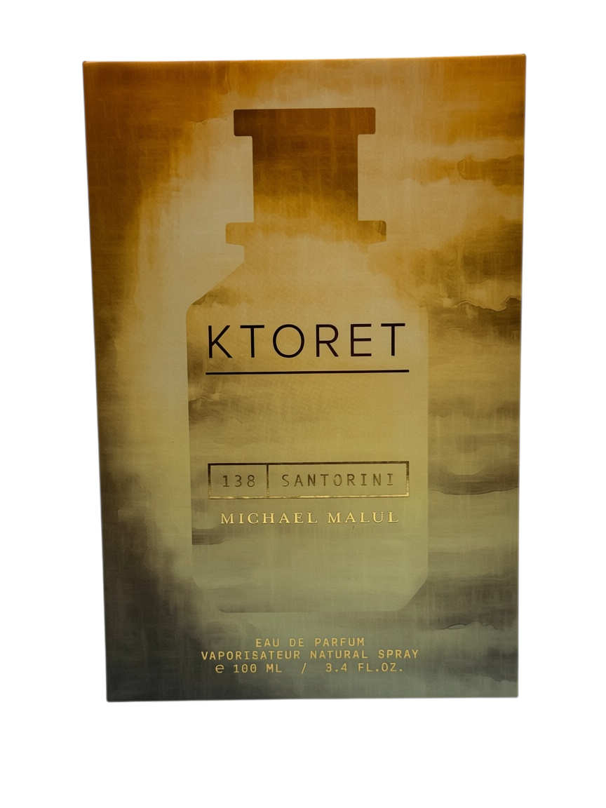 Paradime Enterprise LLC Michael Malul Ktoret 138 Santorini eau de parfum spray box in gold and brown gradient hues.